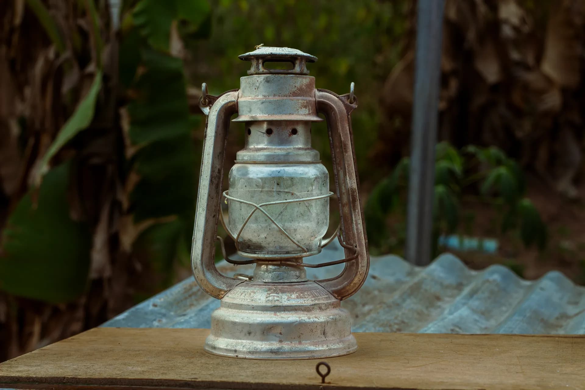 A kerosene lantern standing on a table